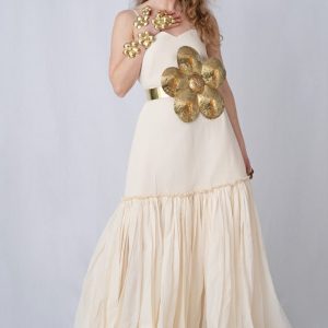 woman wearing white dress and brass belt